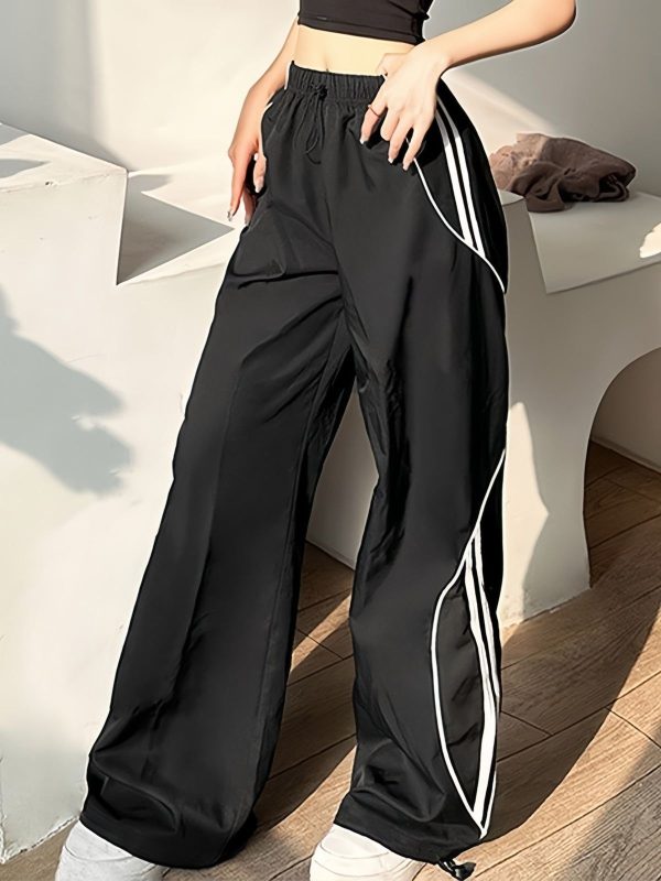 Zingj sport black baggy jogging pants with side piping stripes S