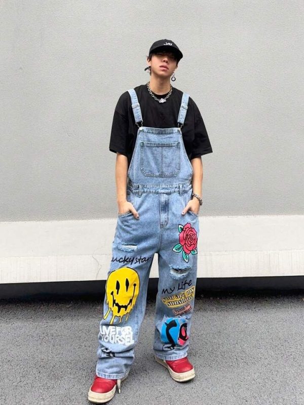 Manfinity EMRG Men Loose Cartoon Face And Flower Print Denim Overalls, Baggy Graffiti Blue Going Out Y2K Outfit For Rapper