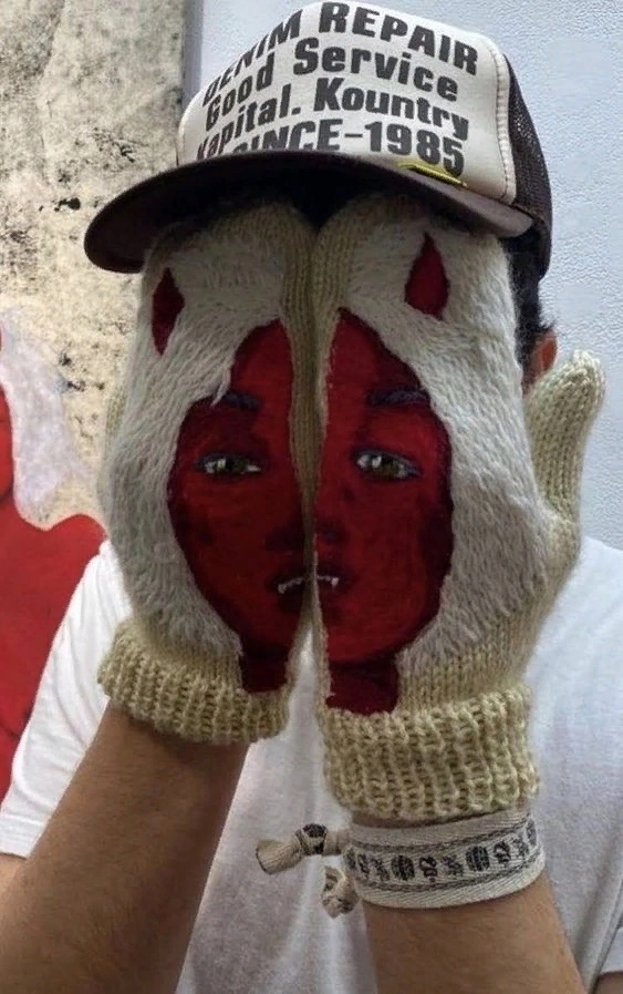 unusual mittens, face image, demons on wear