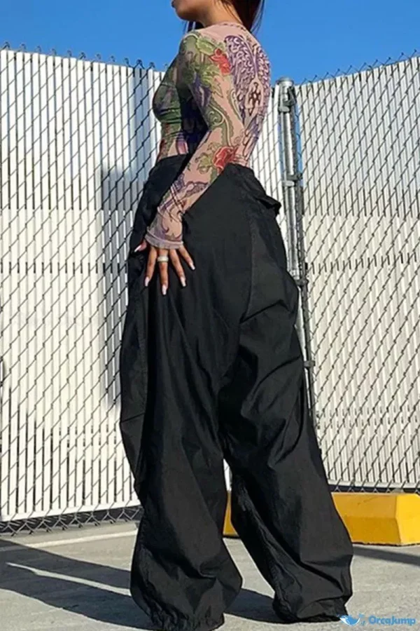 OrcaJump - Pantalones de pata ancha con cintura baja y bolsillos de estilo callejero para mujer en color negro sólido