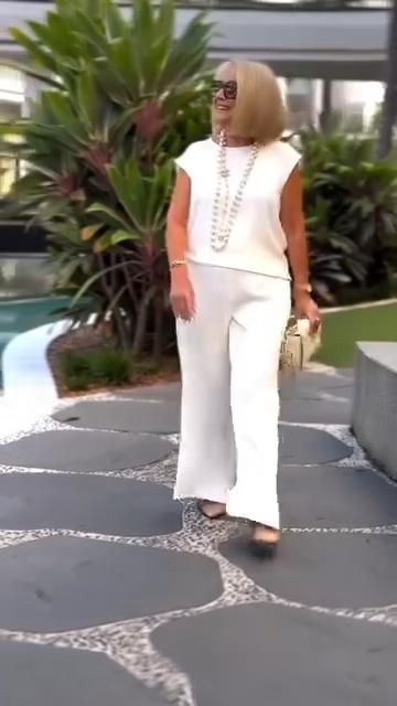 Women's crew neck sleeveless top and pants set