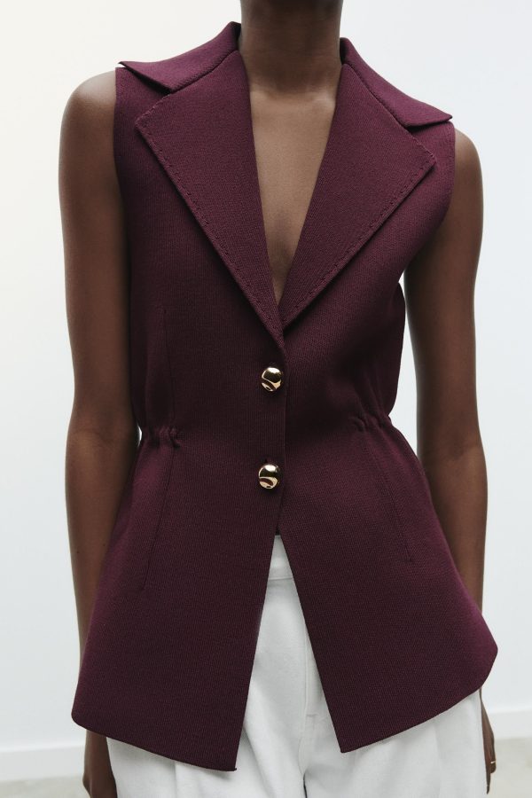 RUFFLED WAIST VEST TOP